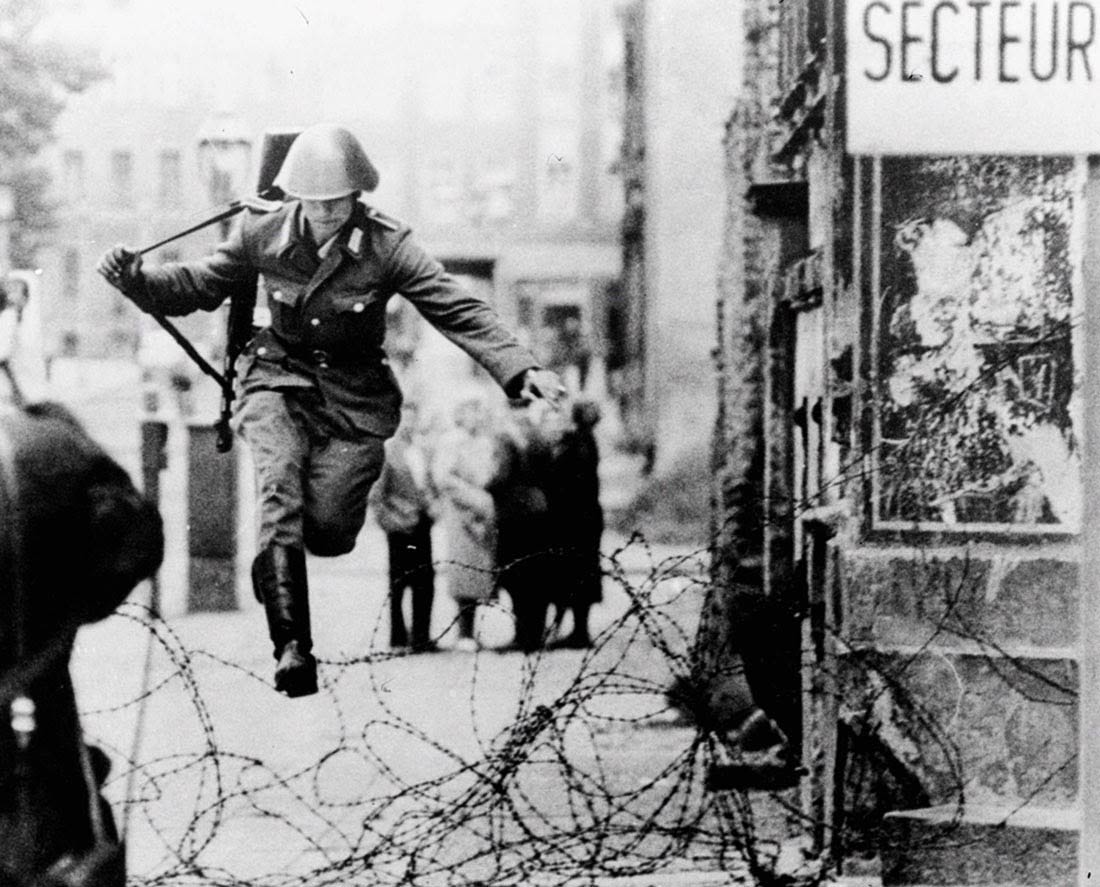 Conrad Schumann was immortalized in this photograph as he leapt across the barricade that would become the Berlin Wall. The photo was called “The Leap into Freedom”. It became an iconic image of the Cold War.