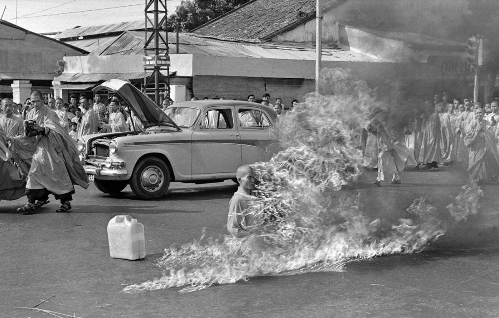 Thich Quang Duc, a Buddhist monk, burns himself to death on a Saigon street on June 11, 1963, to protest alleged persecution of Buddhists by the South Vietnamese government. President Ngo Dình Diem, part of the Catholic minority, had adopted policies that discriminated against Buddhists and gave high favor to Catholics.